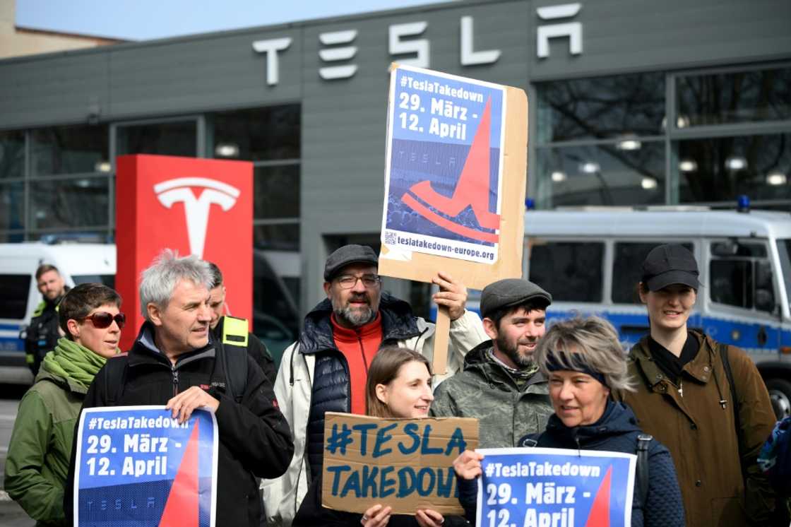 Demonstrators protest at a Tesla service centre in Berlin Demonstrators protest at a Tesla service centre in Berlin