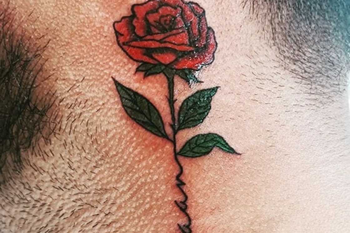 Red neck rose tattoo with a name Red neck rose tattoo with a name