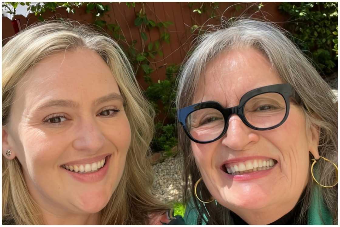 Jennifer and Rose smiling as they take a selfie. Jennifer and Rose smiling as they take a selfie.