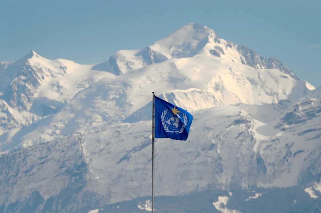 The WMO flag flies on top of its headquarters in Geneva, in front of the Mont Blanc massif The WMO flag flies on top of its headquarters in Geneva, in front of the Mont Blanc massif