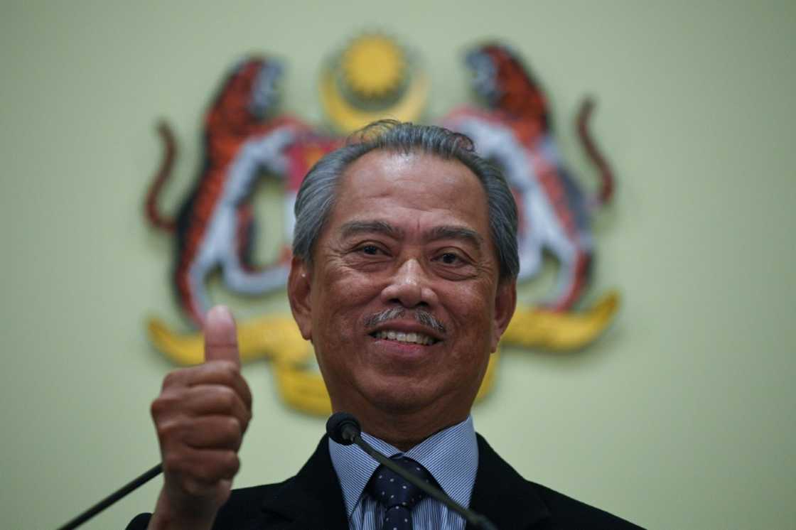 Former premier Muhyiddin Yassin, seen here in 2020, and opposition leader Anwar Ibrahim both claim they have the numbers to form a coalition government in Malaysia Former premier Muhyiddin Yassin, seen here in 2020, and opposition leader Anwar Ibrahim both claim they have the numbers to form a coalition government in Malaysia