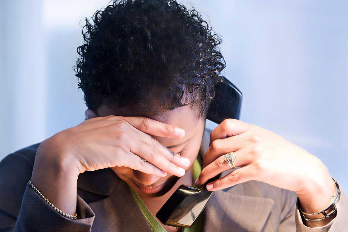 An African woman on the telephone