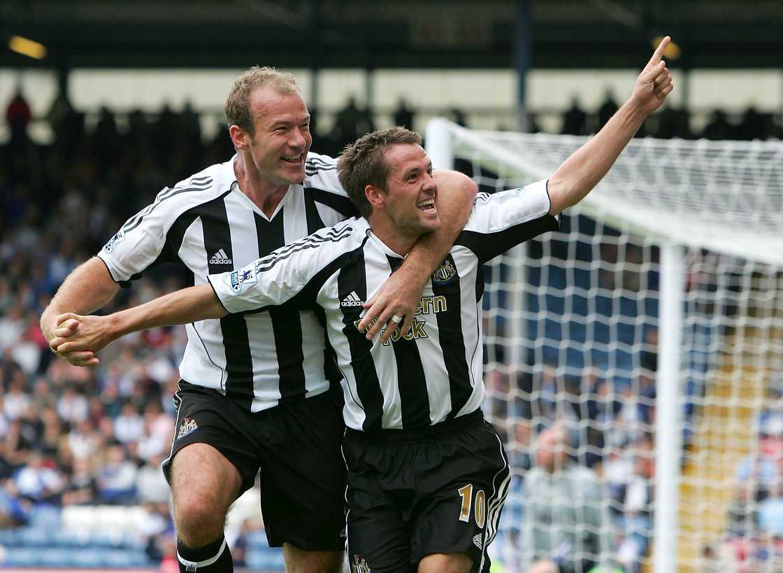 England strikers, football rivalry, Newcastle United legend, Liverpool legend, football pundits, Michael Owen interview, Alan Shearer news, Premier League icons