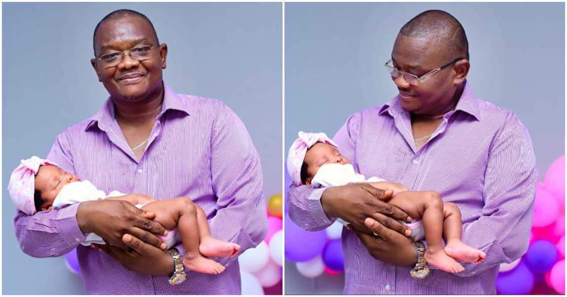 Hon Sylvester Mensah and his grandchild Hon Sylvester Mensah and his grandchild