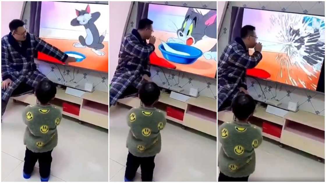 Lovely father makes son laugh hard as he pretends as if he's stealing cartoon character's food in viral video Lovely father makes son laugh hard as he pretends as if he's stealing cartoon character's food in viral video