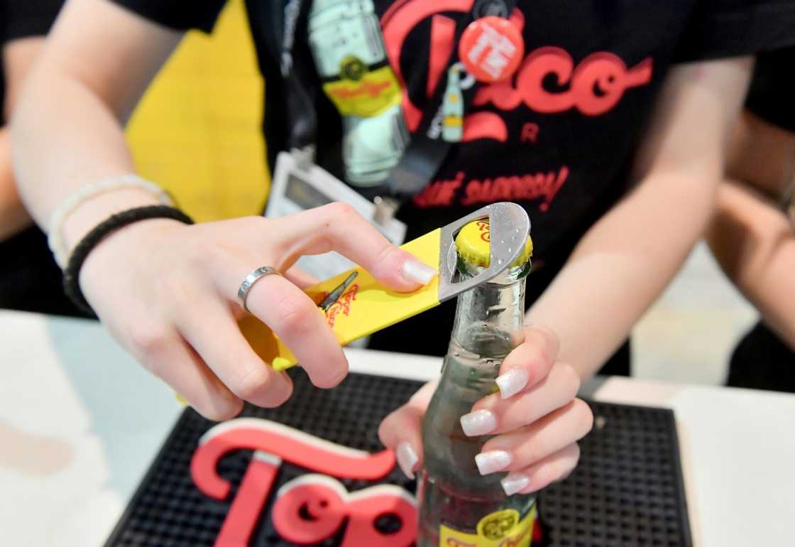 Strong sales of the Topo Chico seltzer brand helped lift Coca-Cola to better than expected profits