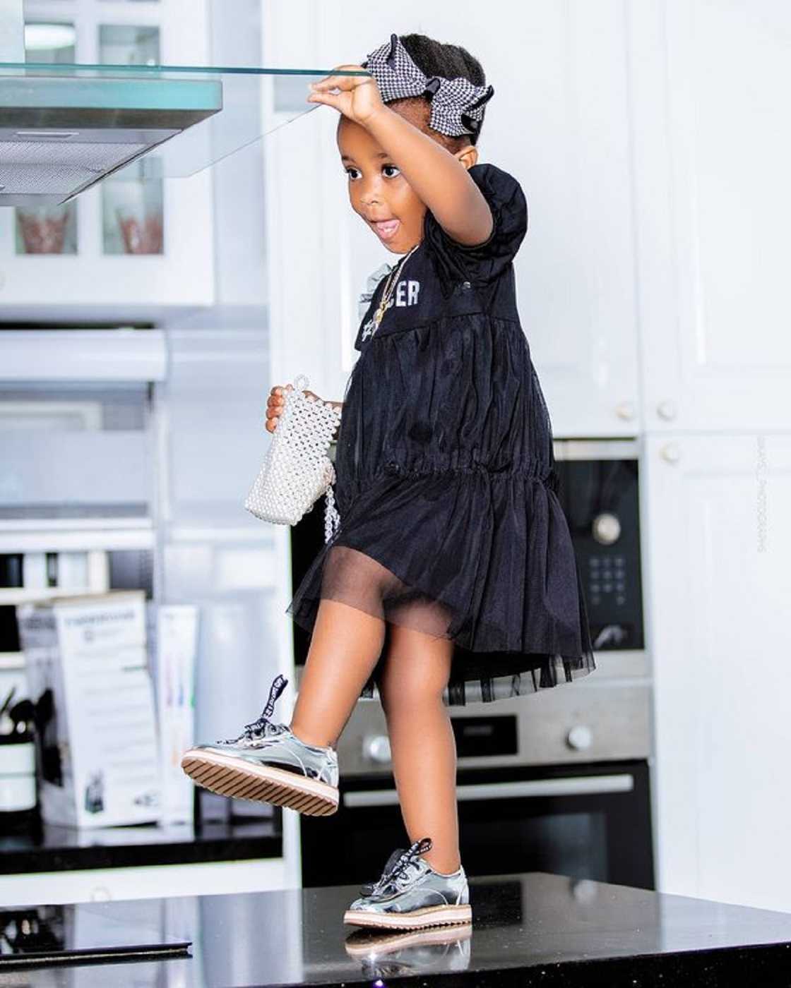 Baby Maxin: McBrown’s Daughter Surprises fans with her Adult Poses in 7 Photos at age 2