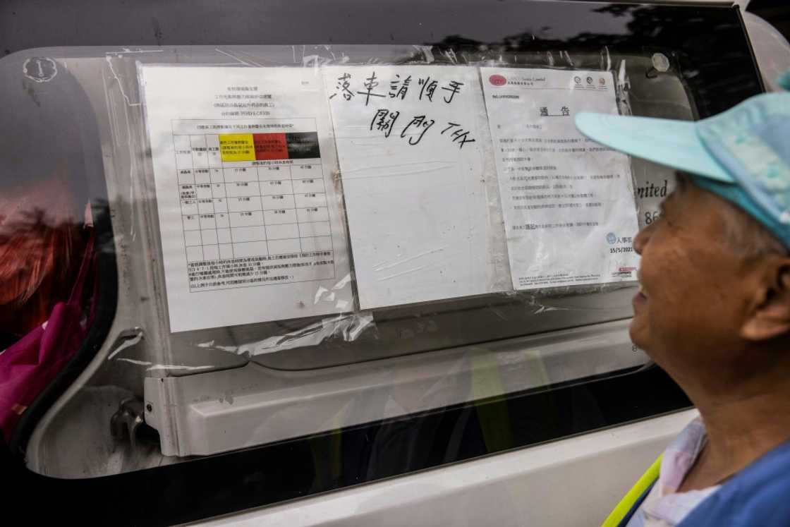A colour-coded system for heat guidelines is displayed on the side of a van in Hong Kong A colour-coded system for heat guidelines is displayed on the side of a van in Hong Kong