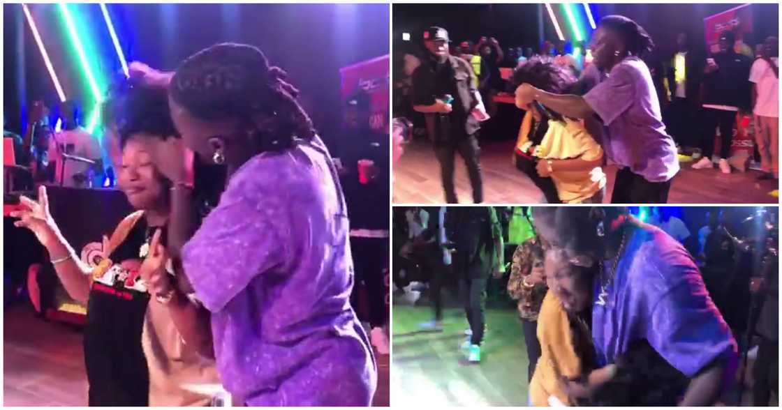 Stonebwoy and a die-hard fan on stage Stonebwoy and a die-hard fan on stage