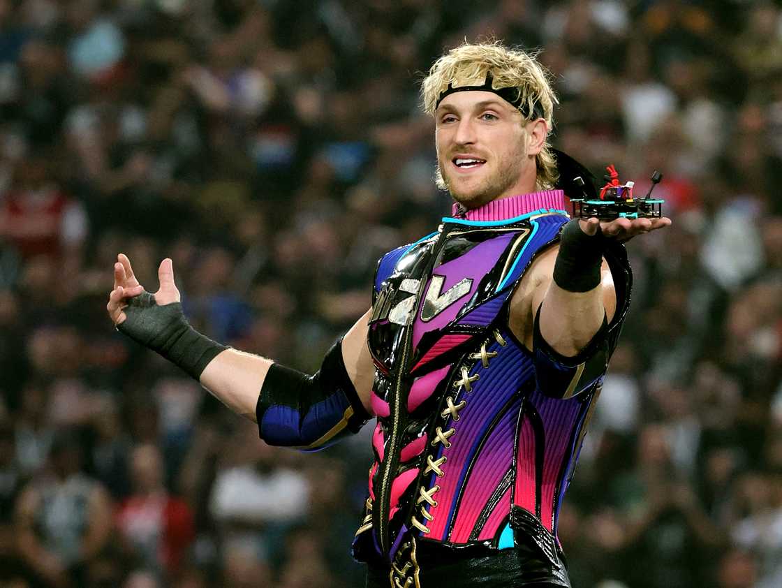 A drone lands on Logan Paul's hand as he is introduced before a match against AJ Styles during WrestleMania 41