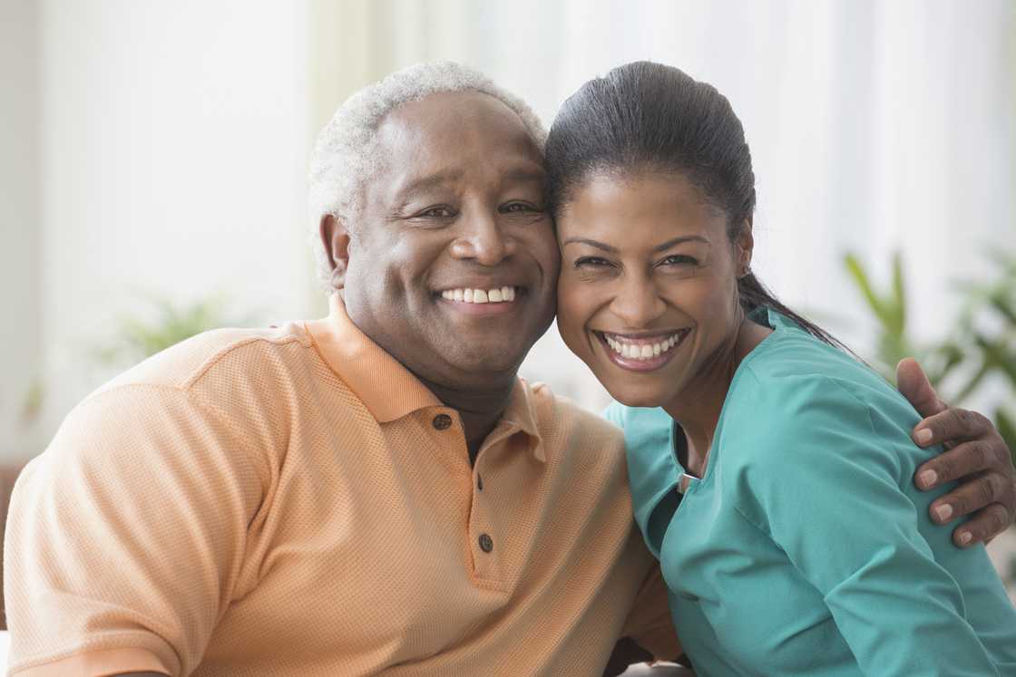A father hugs his daughter