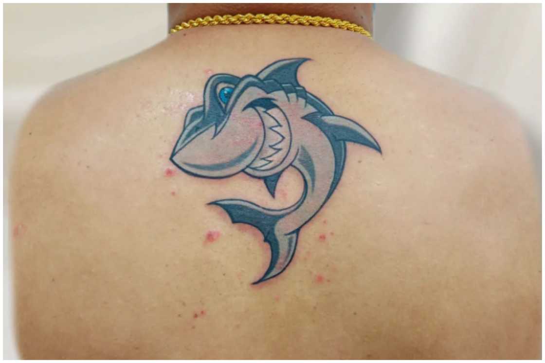 Cartoon shark tattoo