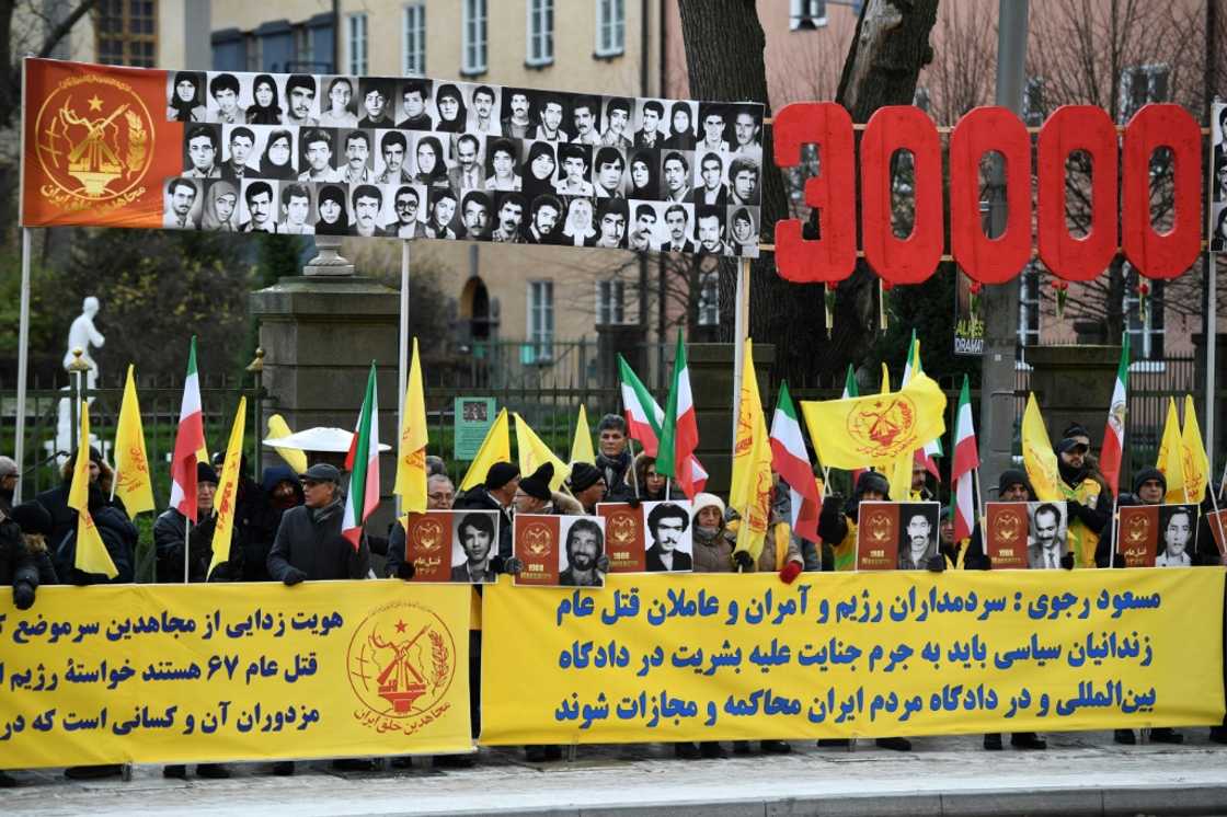 During the trial, protestors demonstrated outside the court over Noury's alleged crimes During the trial, protestors demonstrated outside the court over Noury's alleged crimes