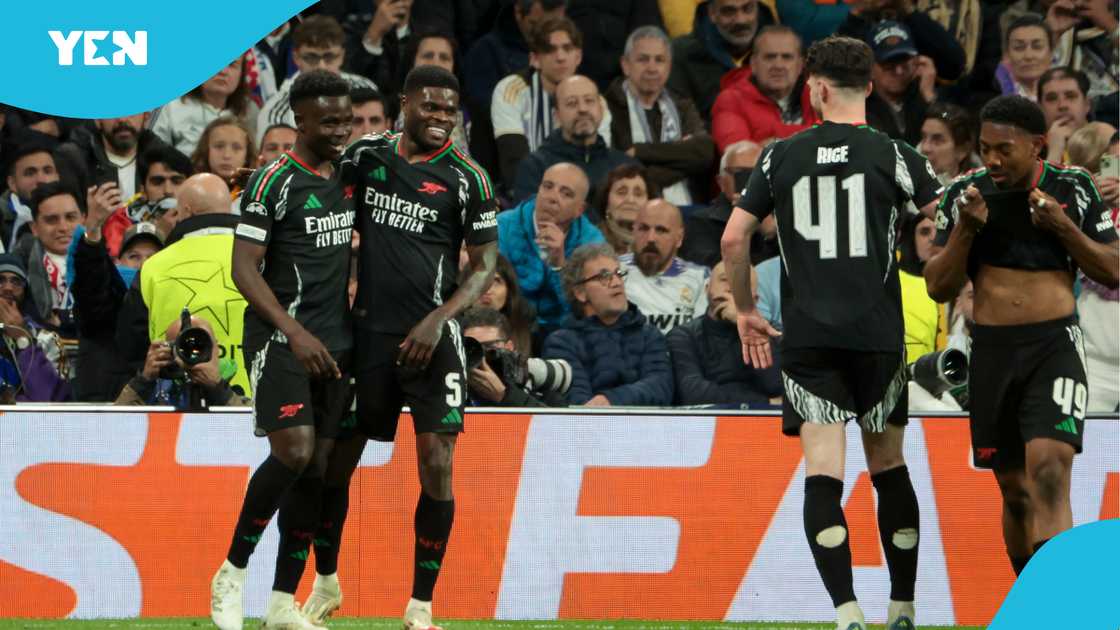 Bukayo Saka of Arsenal celebrates his goal with Thomas Partey of Arsenal during the UEFA Champions League 2024/25 Quarter Final Second Leg match vs Real Madrid C.F at Estadio Santiago Bernabeu stadium on April 16, 2025 in Madrid, Spain Bukayo Saka of Arsenal celebrates his goal with Thomas Partey of Arsenal during the UEFA Champions League 2024/25 Quarter Final Second Leg match vs Real Madrid C.F at Estadio Santiago Bernabeu stadium on April 16, 2025 in Madrid, Spain