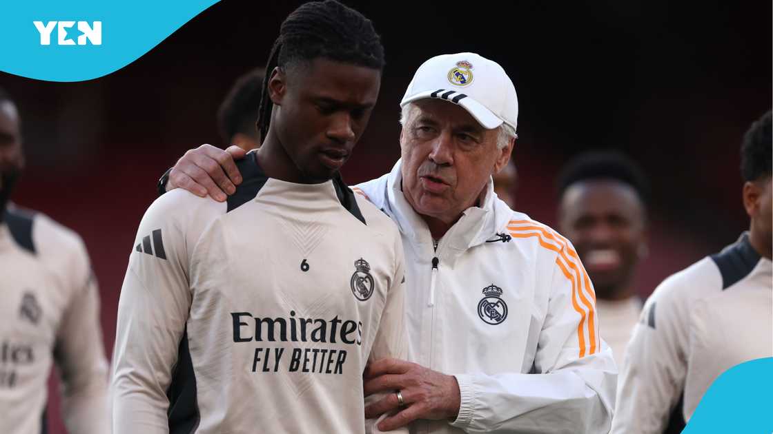 Carlo Ancelotti of Real Madrid, talks with Eduardo Camavinga of Real Madrid during a training session ahead of their UEFA Champions League 2024/25 quarter final first leg match at Emirates Stadium on April 07, 2025 in London, England Carlo Ancelotti of Real Madrid, talks with Eduardo Camavinga of Real Madrid during a training session ahead of their UEFA Champions League 2024/25 quarter final first leg match at Emirates Stadium on April 07, 2025 in London, England