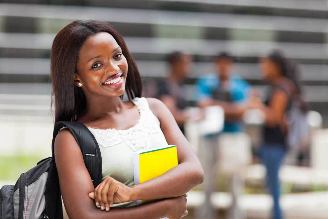 A female African college student on campus A female African college student on campus