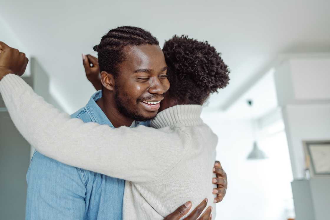 A brother and sister hug