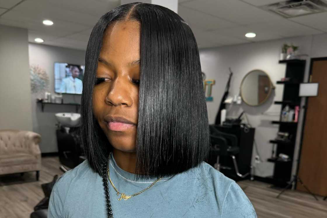 A lady is rocking a blunt haircut A lady is rocking a blunt haircut