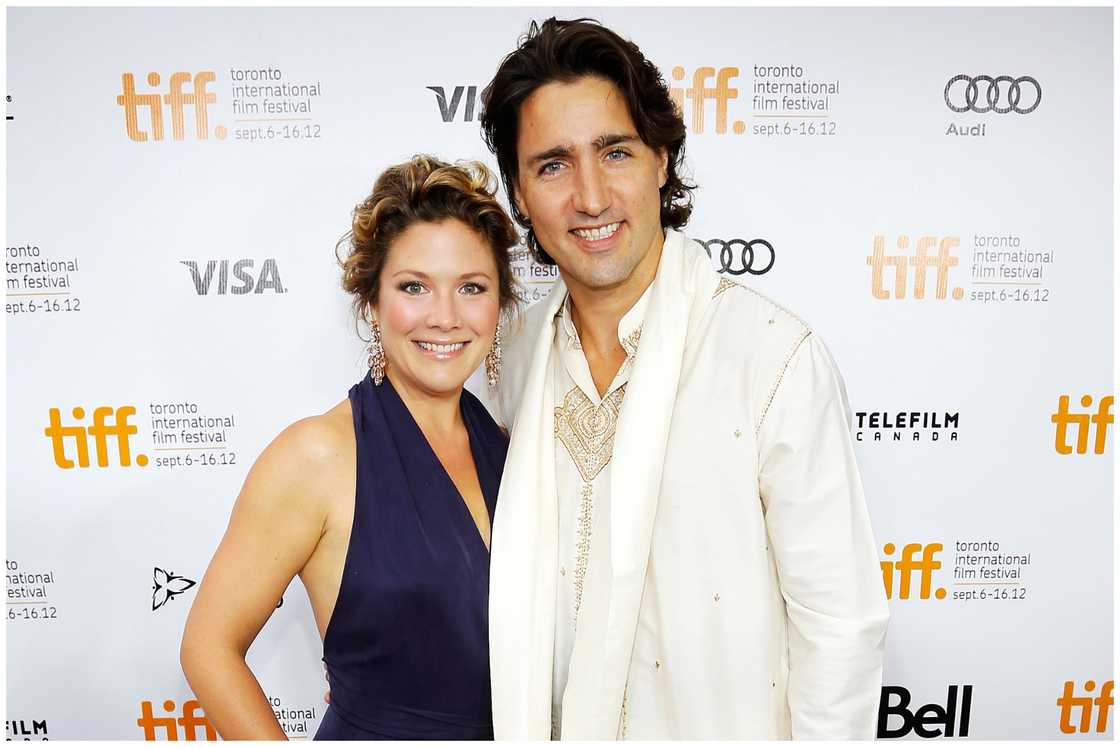 Sophie Gregoire and Justin Trudeau, taking a picture at the "Midnight's Children" Premiere.
