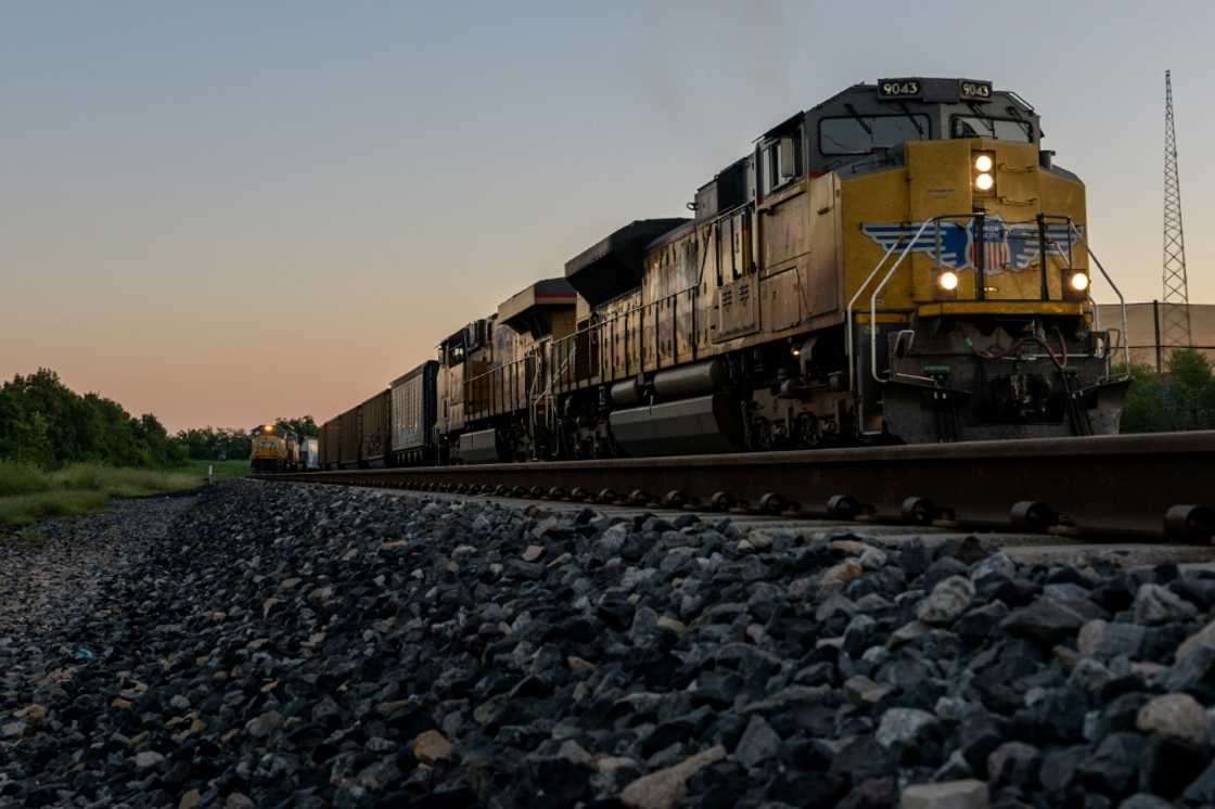 A freight train travels through Houston, Texas A freight train travels through Houston, Texas