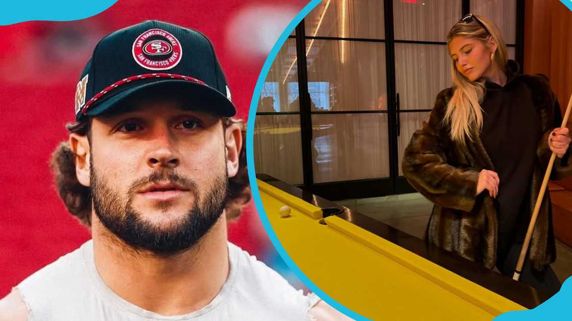 Bosa donning a black cape and white shirt and Ella sporting a dark brown jacket.