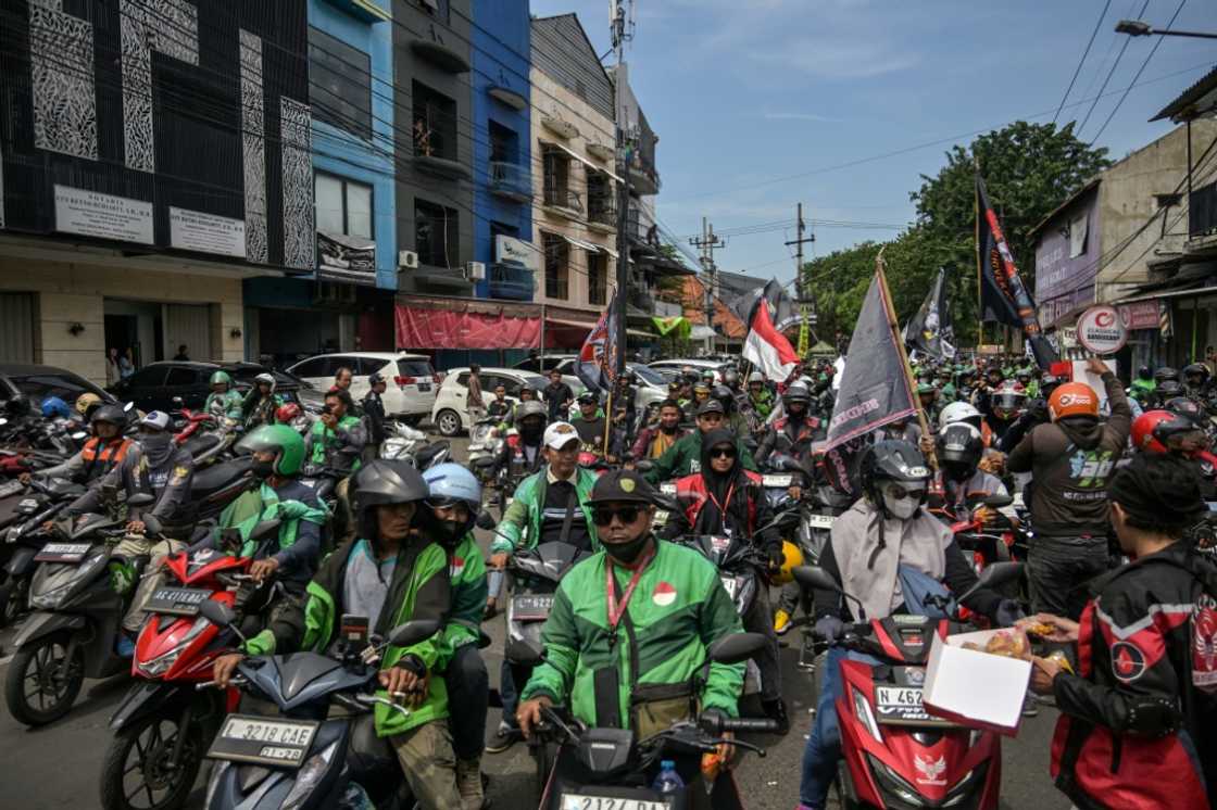 Gig economy drivers protested in Indonesia demanding a 10 percent cap on commission fees Gig economy drivers protested in Indonesia demanding a 10 percent cap on commission fees