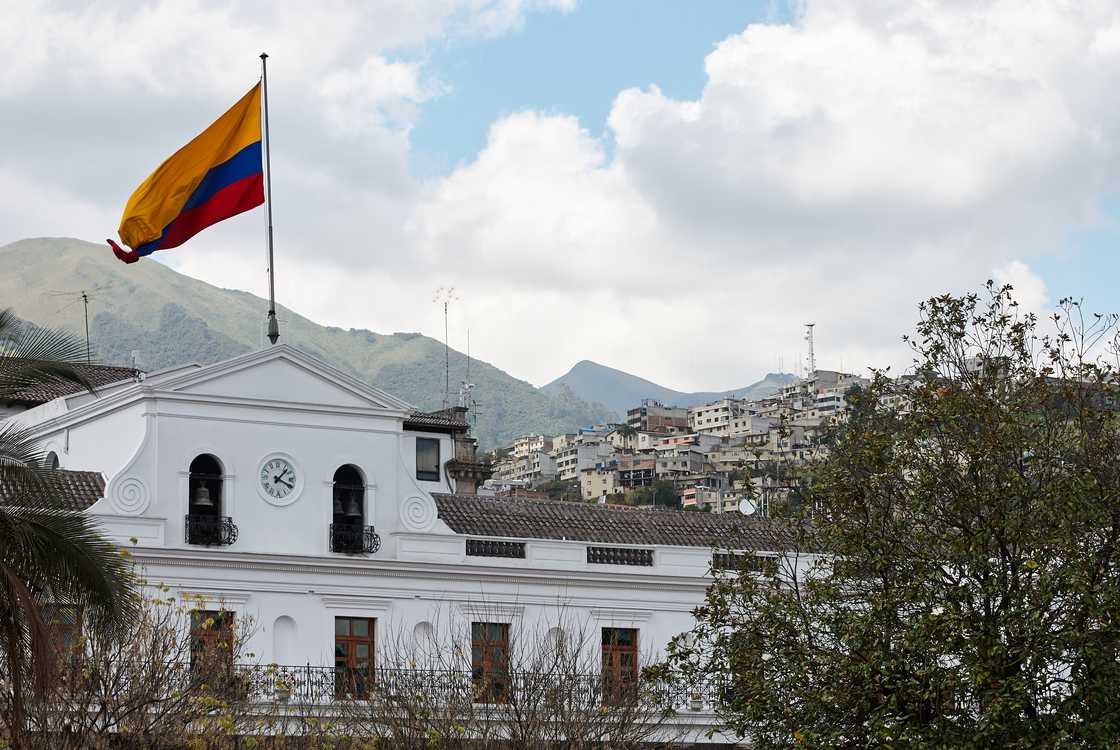 Ecuador's flag on top of a government building Ecuador's flag on top of a government building