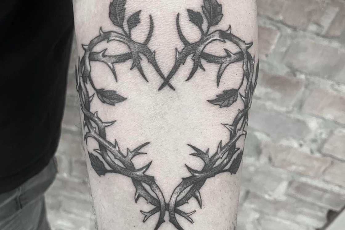 A unique heart elbow tattoo A unique heart elbow tattoo