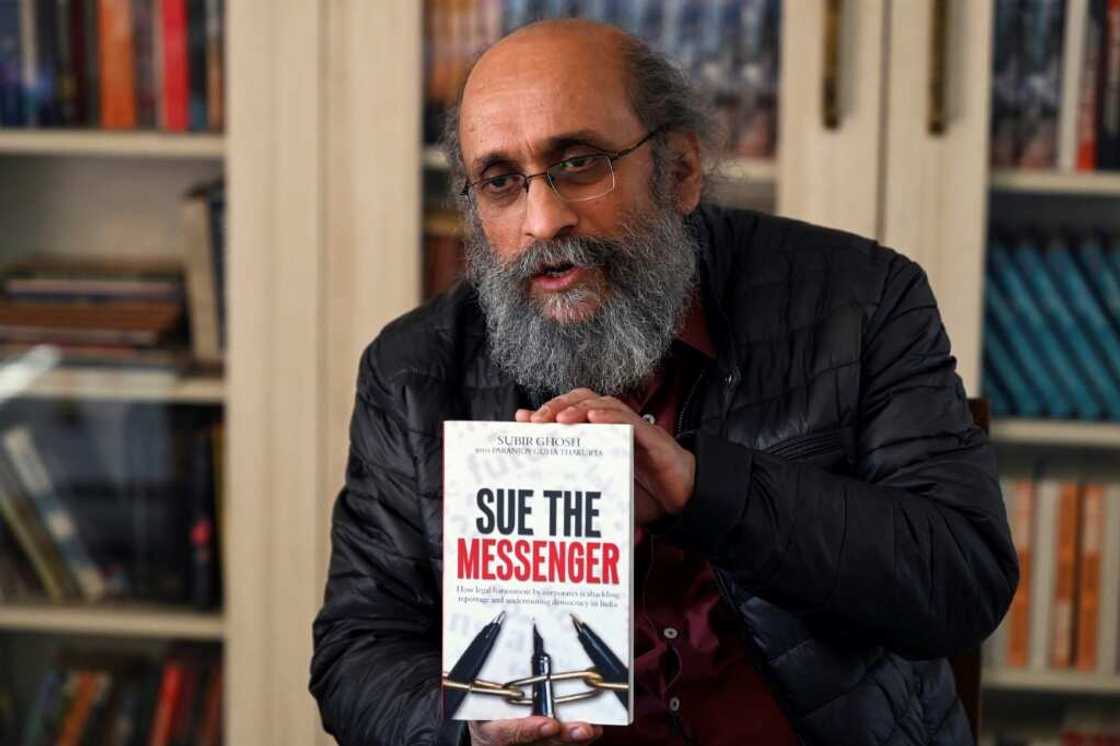 Journalist Paranjoy Guha Thakurta was hit with six defamation actions after writing a series of reports on Adani that included accusations a top judge gave it preferential treatment Journalist Paranjoy Guha Thakurta was hit with six defamation actions after writing a series of reports on Adani that included accusations a top judge gave it preferential treatment