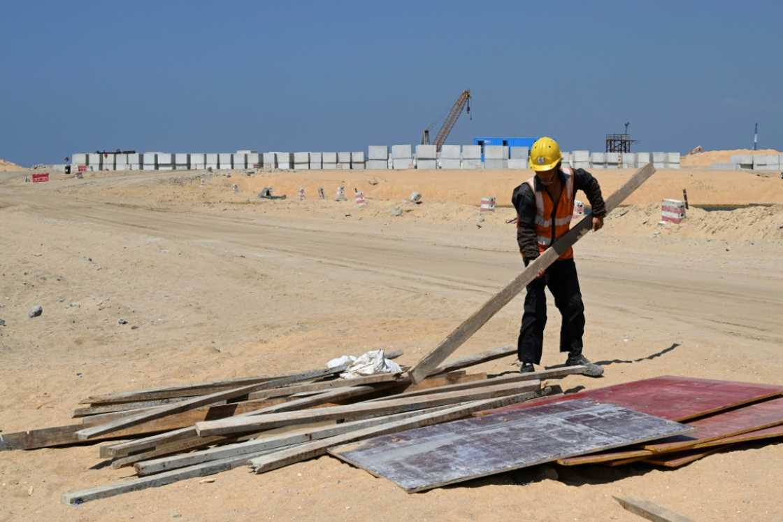 A Chinese labourer works at a construction site in Colombo, Sri Lanka