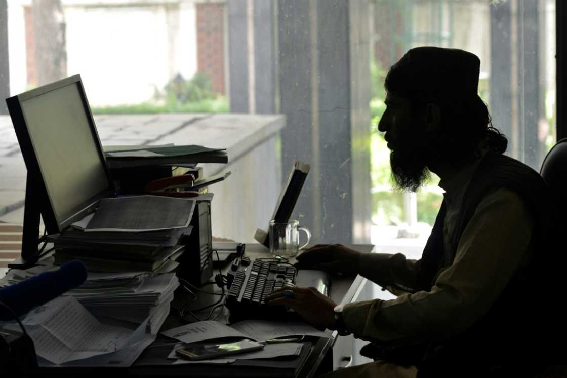 Jalali used to spend his nights planting bombs, now he works at the Ministry of Transport and Civil Aviation in Kabul Jalali used to spend his nights planting bombs, now he works at the Ministry of Transport and Civil Aviation in Kabul