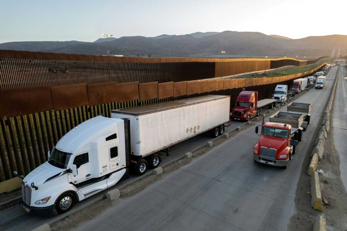 Trucks queue near the Mexico-US border Trucks queue near the Mexico-US border