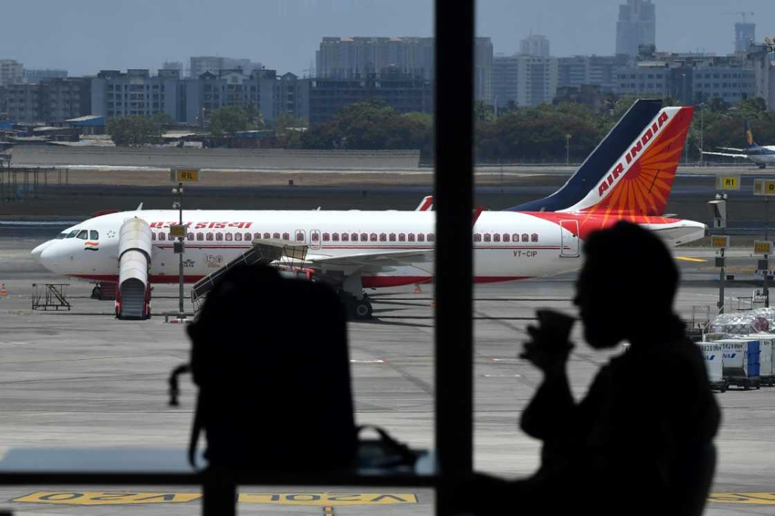 Air India said that some flights to North America, Europe and the Middle East will have to take an "alternative extended route" Air India said that some flights to North America, Europe and the Middle East will have to take an "alternative extended route"