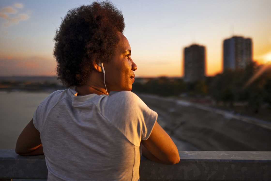 A lady watching the sunset