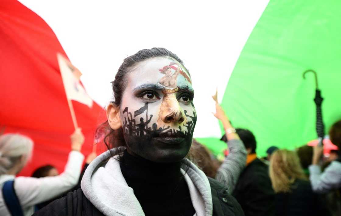 People walked from the French capital's traditional protest hub of Place de la Republique to Place de la Nation People walked from the French capital's traditional protest hub of Place de la Republique to Place de la Nation