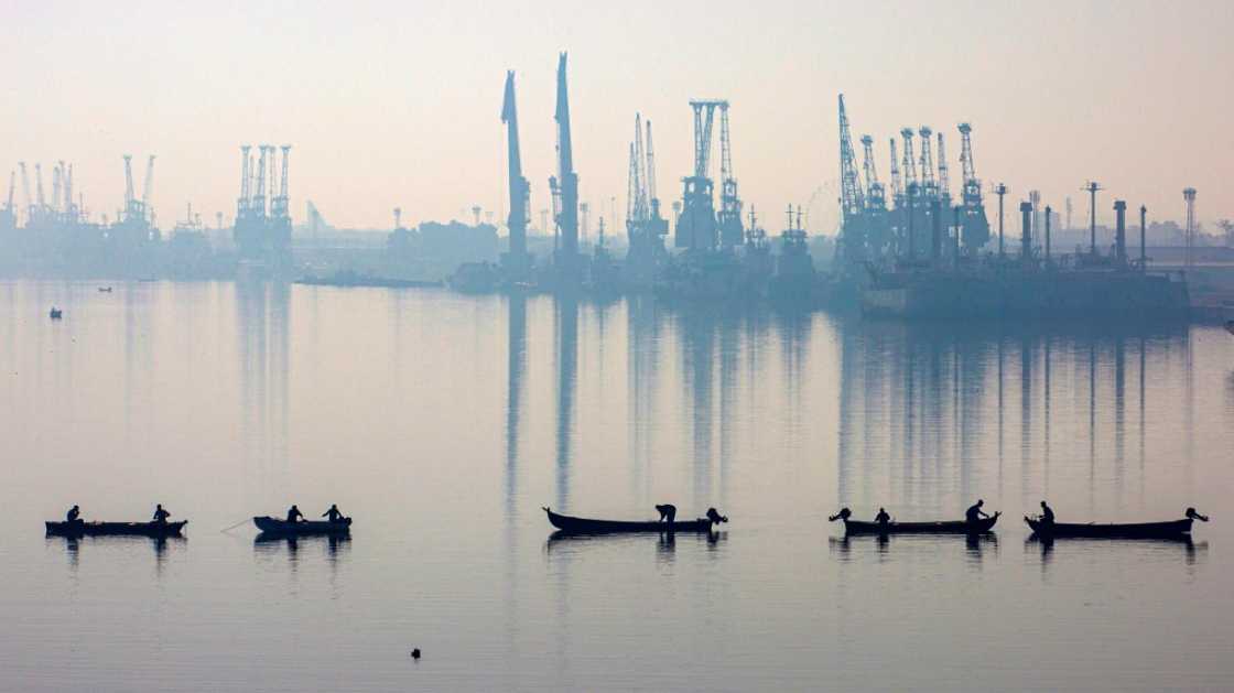 Fishing boats by the main port of Maqil in Iraq's southern city of Basra Fishing boats by the main port of Maqil in Iraq's southern city of Basra