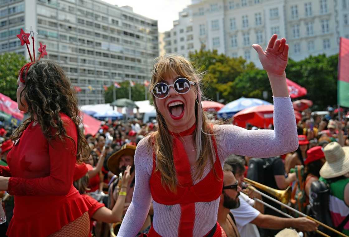 A supporter of president-elect Luiz Inacio Lula da Silva celebrates his election victory during a street carnival in Copacabana, Rio de Janeiro, Brazil, on November 6, 2022 A supporter of president-elect Luiz Inacio Lula da Silva celebrates his election victory during a street carnival in Copacabana, Rio de Janeiro, Brazil, on November 6, 2022