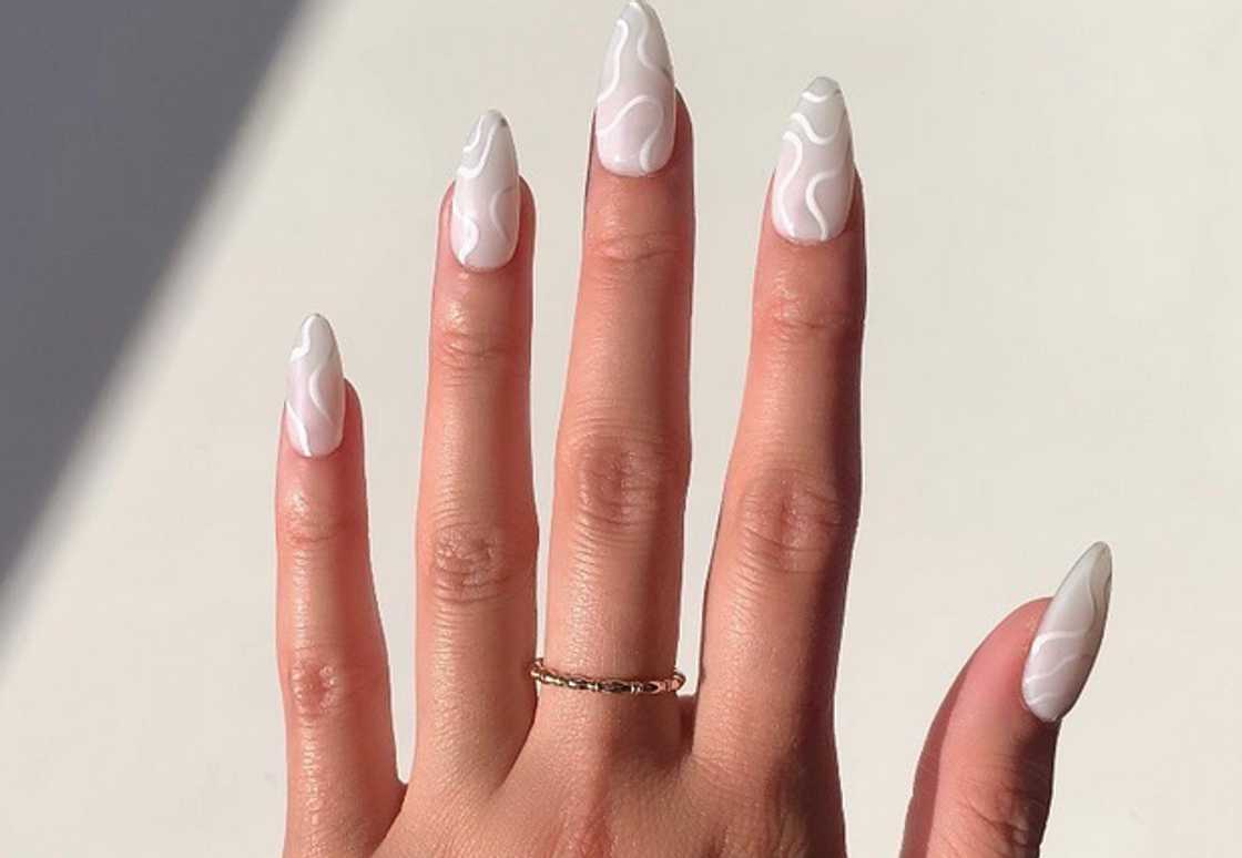 Edgy yet delicate milky nails