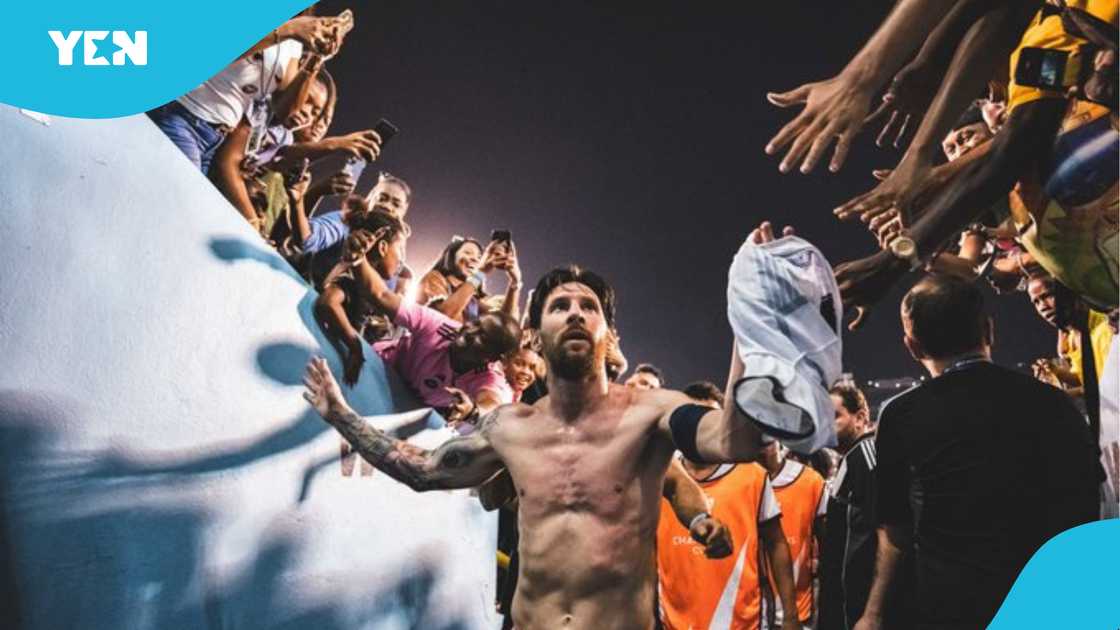 Lionel Messi shakes hands of fans in Jamaica. Lionel Messi shakes hands of fans in Jamaica.