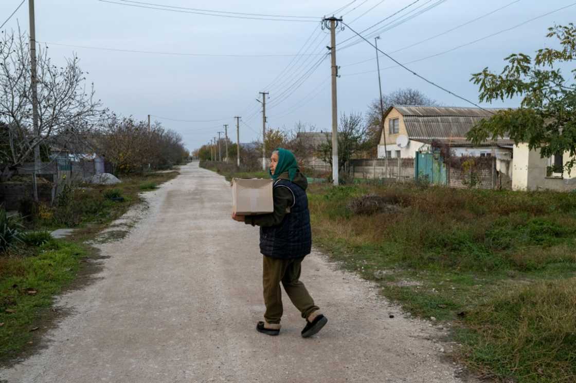 Villagers who return to their frontline region homes depend on food aid to survive Villagers who return to their frontline region homes depend on food aid to survive