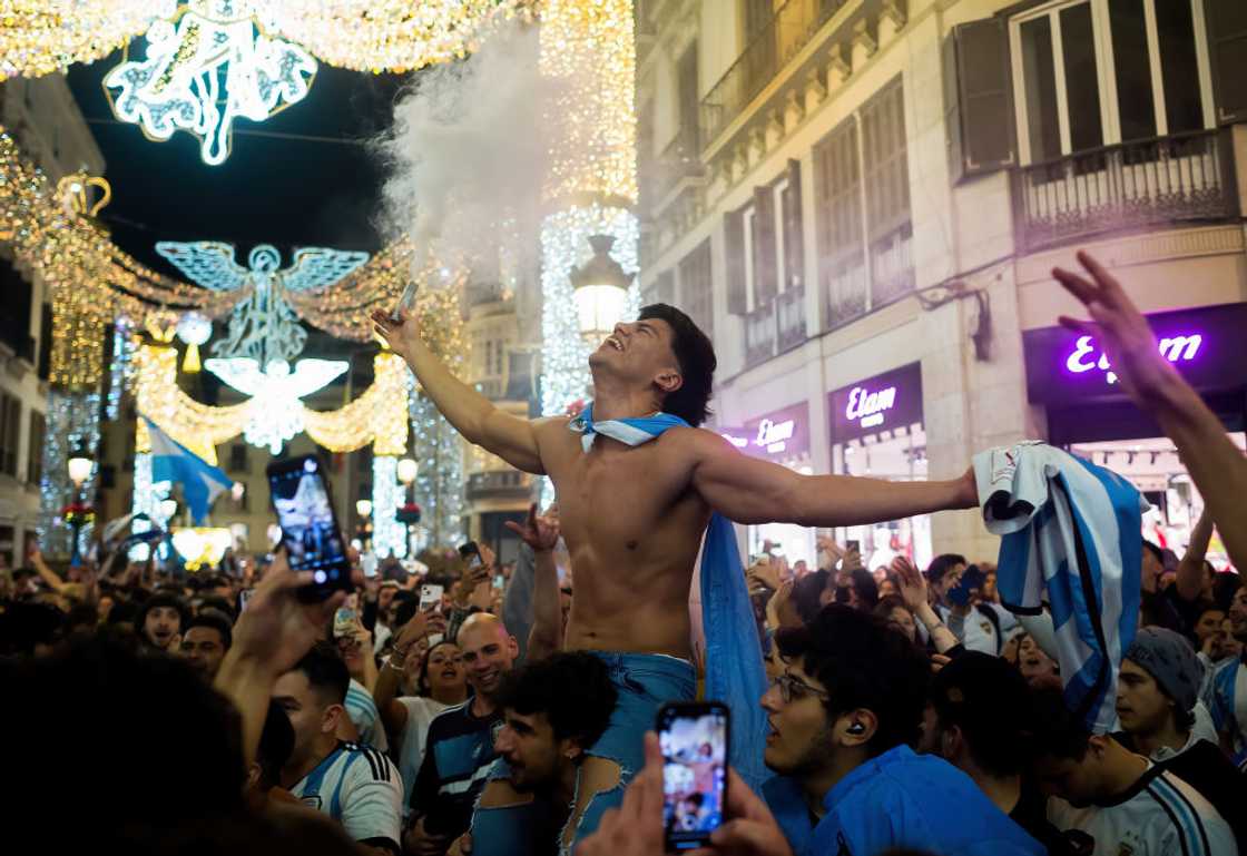 A shirtless Argentinian fan is seen celebrating Argentina's victory after the FIFA 2022 World Cup final match. A shirtless Argentinian fan is seen celebrating Argentina's victory after the FIFA 2022 World Cup final match.