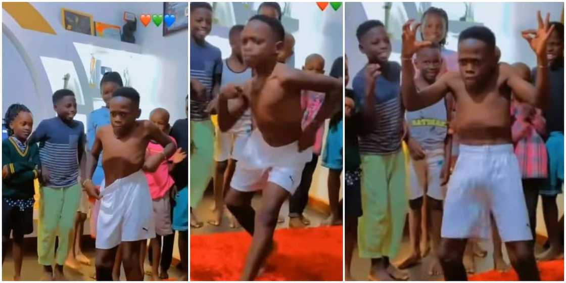 Little boy mesmerizes Oyinbo man at gathering with sweet belly dance, whines waist like a lady in cute video Little boy mesmerizes Oyinbo man at gathering with sweet belly dance, whines waist like a lady in cute video