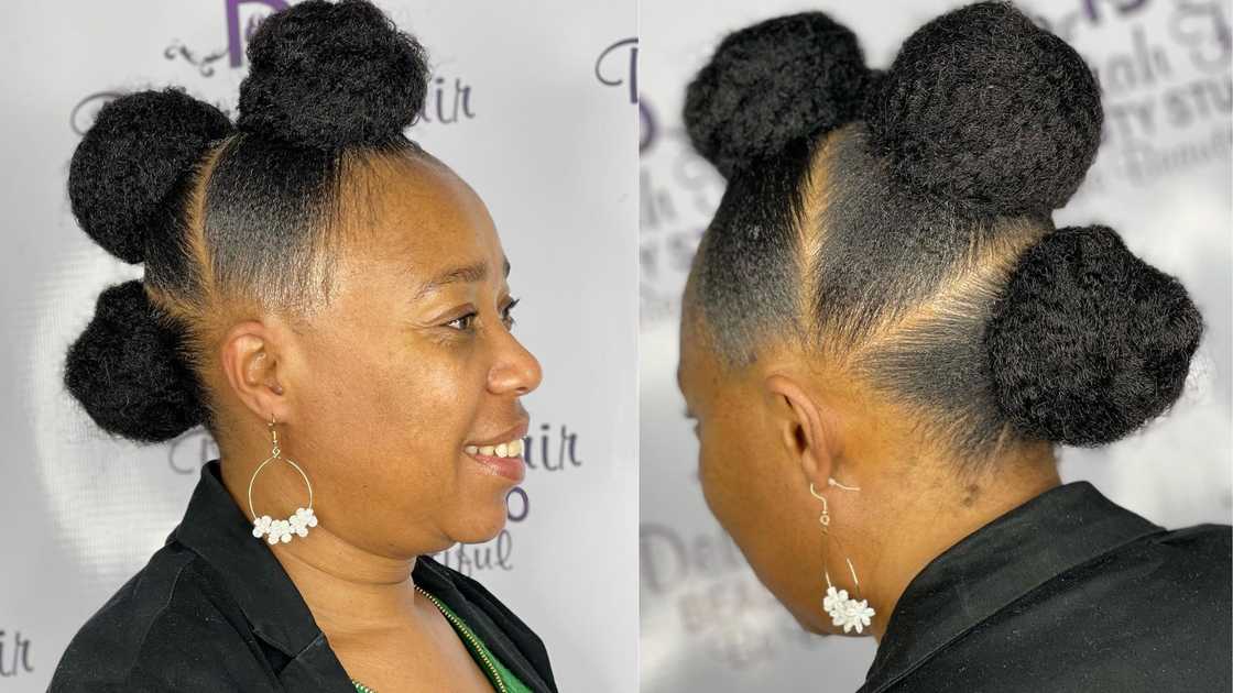 A woman wearing Mohawk-styled triple kinky buns A woman wearing Mohawk-styled triple kinky buns