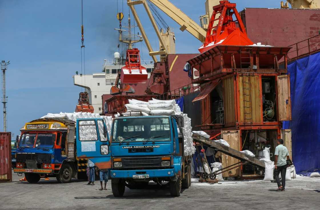 Trucks carrying fertiliser arrive at a port in Colombo. Sri Lanka has been experiencing acute shortages of a range of goods Trucks carrying fertiliser arrive at a port in Colombo. Sri Lanka has been experiencing acute shortages of a range of goods
