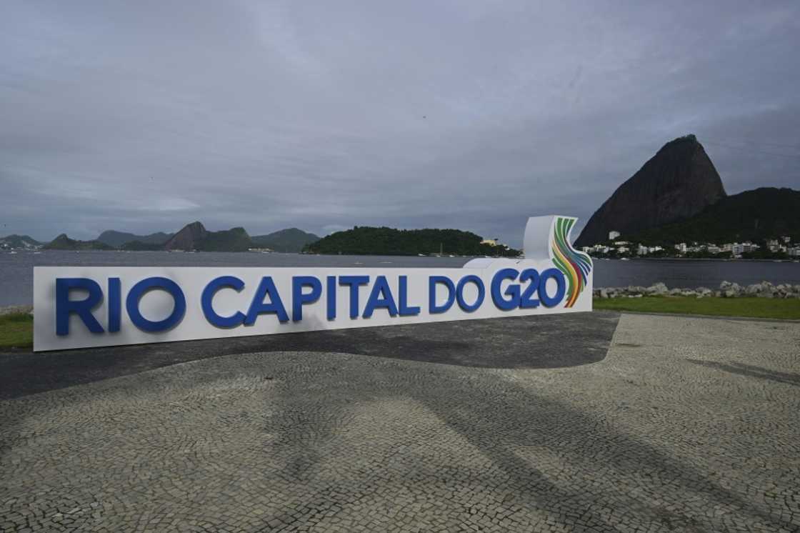 A G20 Brazil sign is seen in front of Rio de Janeiro's iconic Sugarloaf Mountain