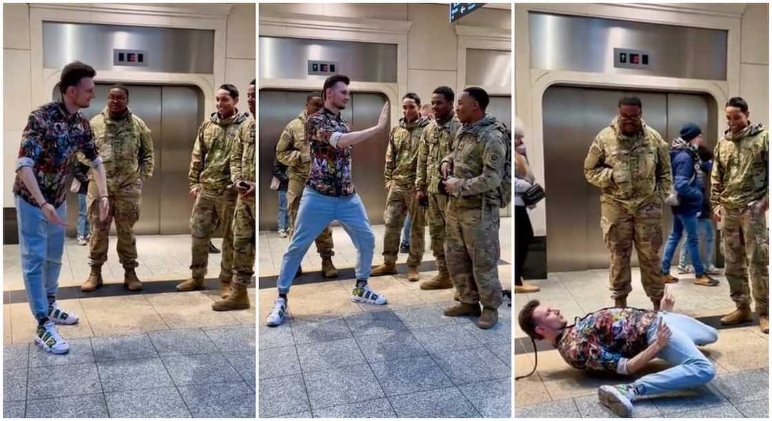 Man dances for American soldiers in Poland, twists his body like Michael Jackson. Man dances for American soldiers in Poland, twists his body like Michael Jackson.