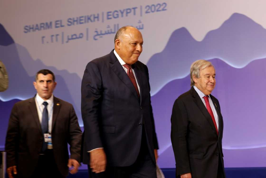Egypt's Foreign Minister and COP27 chair Sameh Shoukry, in the centre, with United Nations Secretary-General Antonio Guterres on the right Egypt's Foreign Minister and COP27 chair Sameh Shoukry, in the centre, with United Nations Secretary-General Antonio Guterres on the right