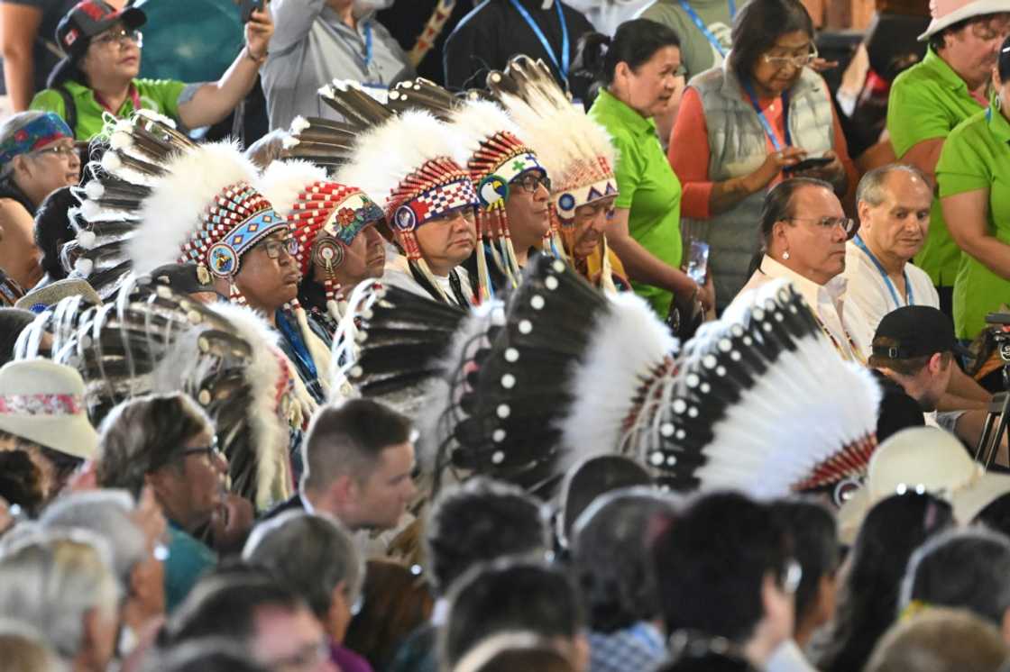 Indigenous community members listen to Pope Francis give a liturgy at at Lac Ste. Anne, northwest of Edmonton, Alberta, Canada, July 26, 2022 Indigenous community members listen to Pope Francis give a liturgy at at Lac Ste. Anne, northwest of Edmonton, Alberta, Canada, July 26, 2022