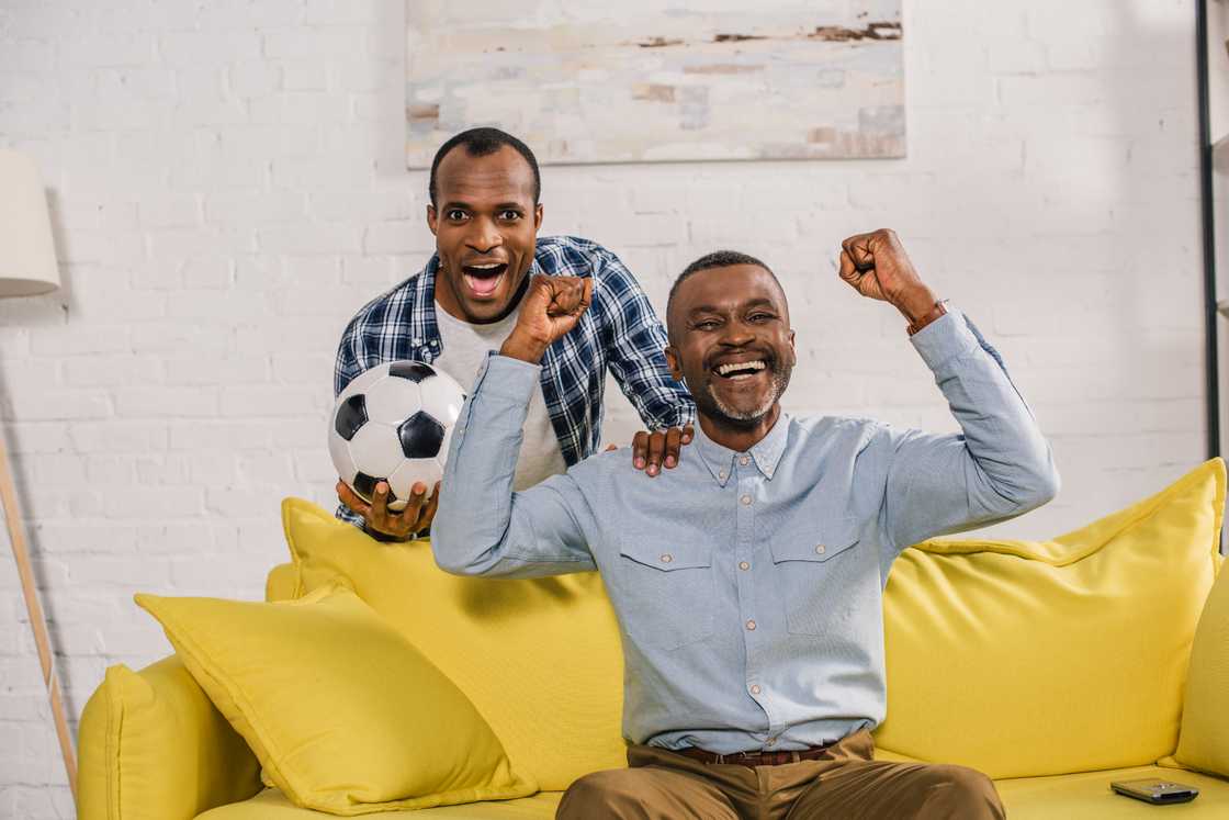 An excited father and son