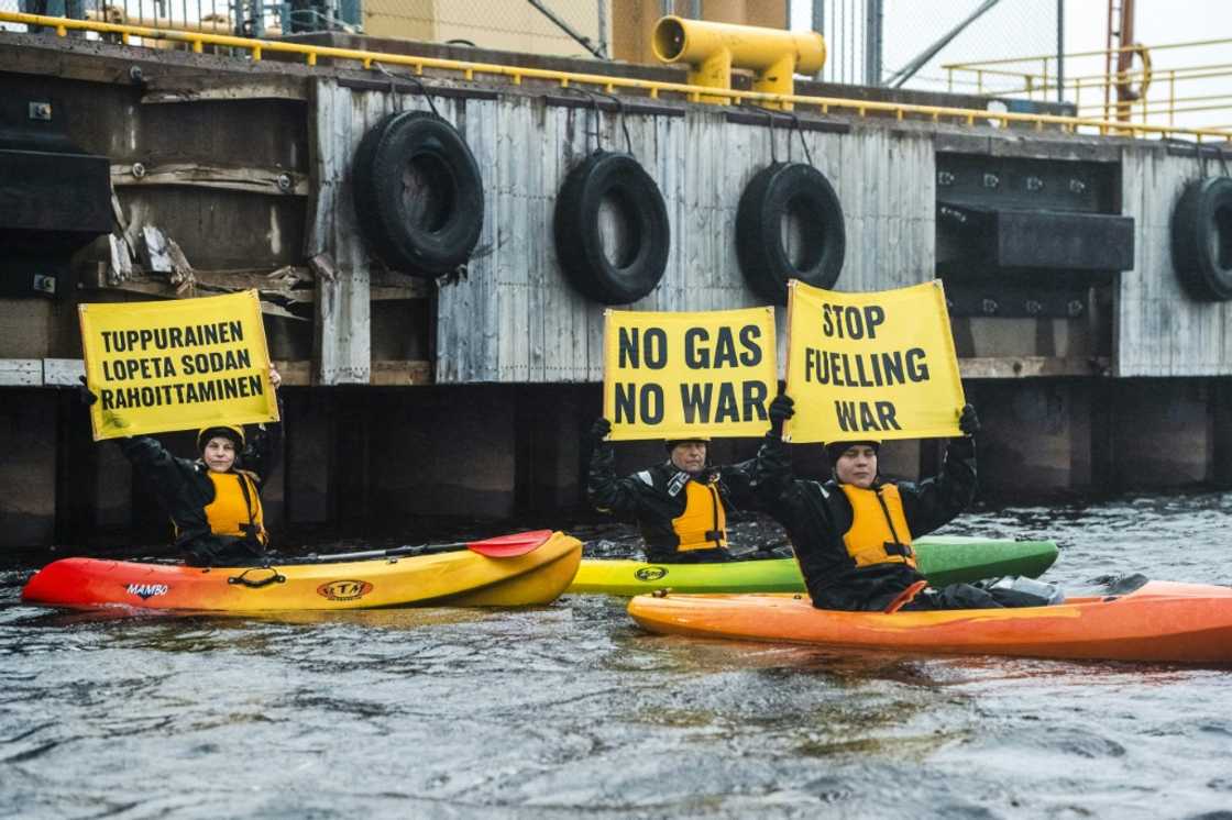 Greenpeace activists seek to block a Russian gas shipment from being offloaded in Finland on September 17, 2022 Greenpeace activists seek to block a Russian gas shipment from being offloaded in Finland on September 17, 2022